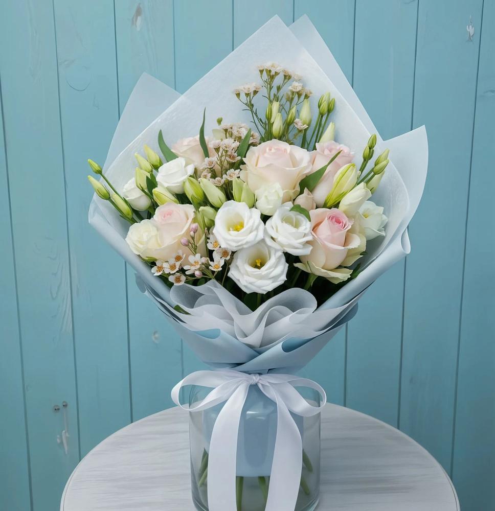 Букет цветов из: Розы и Лизиантусы в Южном